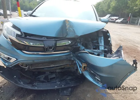 2015 Honda Cr-V Exl z USA, uszkodzony, nr VIN 5J6RM4H7XFL034324